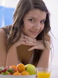 Girl with Fresh Fruit and Orange Juice Photographic Print