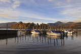 Small Boats Docked at Lakeside, Derwentwater, Lake District National Park, Cumbria, England, UK Photographic Print by Ian Egner