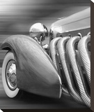 Duesenberg in Motion Stretched Canvas Print by James Richard