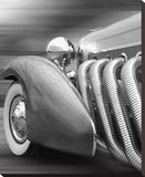 Duesenberg in Motion Stretched Canvas Print by James Richard
