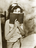 Young girl reading Photographic Print by Scherl 