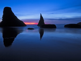 Sea Stacks Line Bandon, Oregon Beach after Sunset During the Blue Hour. Photographic Print by Patricia Davidson