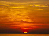 Orange Sunrise on the Water of the Bay on Tighlman Island, Md. Photographic Print by Karine Aigner