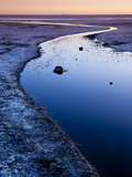 Sunset on the Edge of the Salar De Uyuni on Bolivia's Altiplano. Photographic Print by Sergio Ballivian