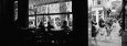 Tourists in a Cafe, Amsterdam, Netherlands Lámina fotográfica por Panoramic Images