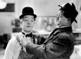 Laurel and Hardy in Tit for Tat Lámina por G. Neri