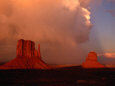 Storm and Dust Clouds Over Rock Formations, Monument Valley Navajo Tribal Park, Arizona, USA Lámina fotográfica por Curtis Martin