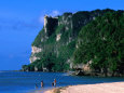 People in Water at Tumon Beach with Amantes (Two Lovers) Point Behind, Tumon, Guam Fotografie-Druck von John Elk III