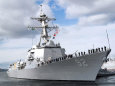 Sailors Stationed Aboard the Guided-Missile Destroyer USS Momsen DDG 92 Man the Rails