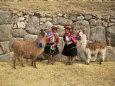 Local Women and Llamas in Front of Inca Ruins, Near Cuzco, Peru, South America Lámina fotográfica por Gavin Hellier