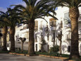 Spanish Architecture and Palm Trees, Tarifa, Andalucia, Spain Photographic Print by D H Webster