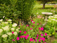 Birdbath and Flowers, Oakland House Seaside Resort, Brooksville Lámina fotográfica por Jerry & Marcy Monkman