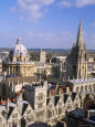 Aerial View Over the Dome of the Radcliffe Camera and a Spire of an Oxford College, England, UK