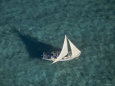 Aerial of a Sailboat over Glover's Reef, Belize Lámina fotográfica por Kenneth Garrett