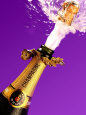 Cork Flying out of Champagne Bottle