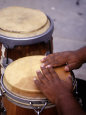 Man Playing Bongos Photographic Print by B & C Gillingham