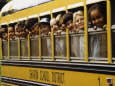 School Children Looking Out School Bus Windows Lámina fotográfica por Len Rubenstein