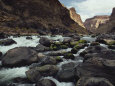Colorado River Flows over a Rocky Streambed Lámina fotográfica por W. E. Garrett
