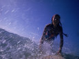 Low Angle View of a Teenage Girl Riding a Surfboard Premium Photographic Print by George Silk
