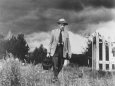 Country Doctor Ernest Ceriani Making House Call on Foot in Small Town Lámina fotográfica por W. Eugene Smith
