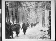 American soldiers on their tay to cut Off St. Vith Houffalize Road in Belgium, During WWII