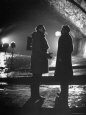 Carol Reed Coaching Orson Welles as They Stand Against Floodlights During Filming The Third Man.