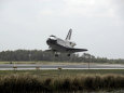 Space Shuttle Discovery Approaches Landing on the Runway at the Kennedy Space Center