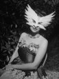 Woman Wearing a Mask to a Masked Ball