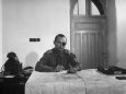 Commander of Israel's Armed Forces in Jerusalem Moshe Dayan, Sitting at the Table Studying a Map